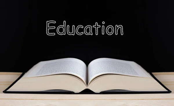 Book on Blackboard, Education Concept — Stock Photo, Image