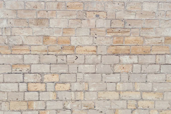 セメントを用いた灰色装飾的な不均一なひびの入った石壁の表面. — ストック写真