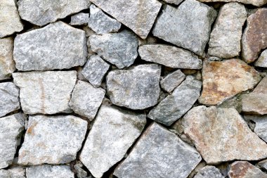 eski taş duvar dokusu içinde yıpranmış ve doğal yüzeyler var..