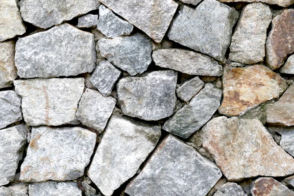 Viejo muro de piedra Textura en envejecido y tienen superficies naturales . — Foto de Stock