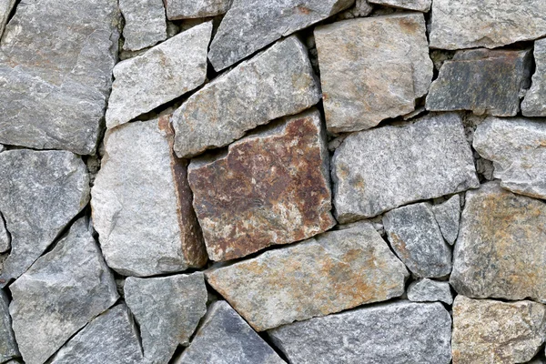 Vieux mur de pierre Texture en altérée et ont des surfaces naturelles . — Photo
