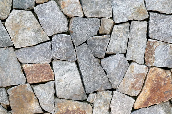 Viejo muro de piedra Textura en envejecido y tienen superficies naturales . —  Fotos de Stock