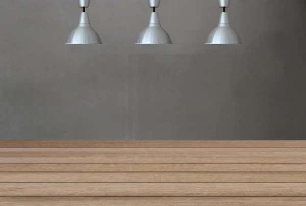 Silver lamps on the ceiling and a backdrop on a concrete wall wi