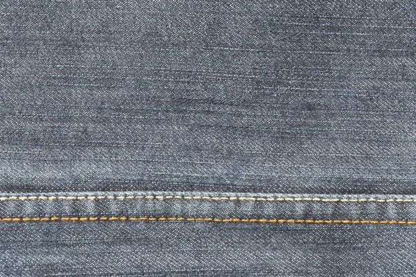 Fabric pattern seam texture of denim or blue jeans. — Stock Photo, Image