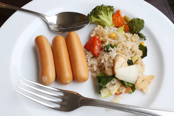 Fried rice and sausage on white dish. — Stock Photo, Image