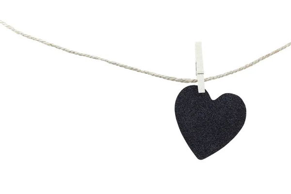 Black Heart hung on hemp rope isolated on white background. — Stock Photo, Image