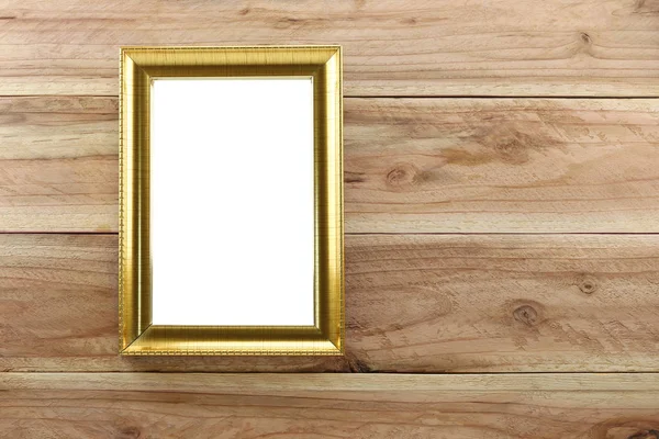 Moldura de foto de ouro vintage no fundo de madeira . — Fotografia de Stock