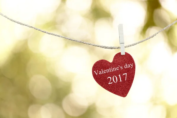 Red Heart hung on hemp rope and have text Happy Valentine's Day — Stock Photo, Image