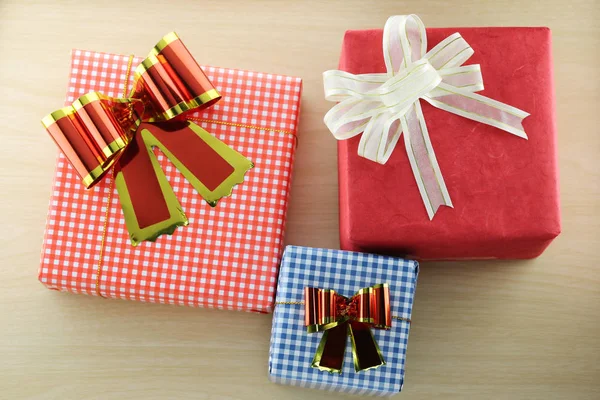 Gift box on wooden plank background in Concept Christmas. — Stock Photo, Image