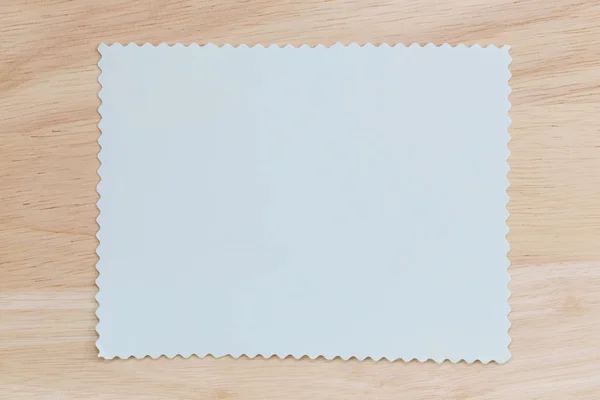 Blue notepad paper crumpled of empty and copy space on wooden ba — Stock Photo, Image