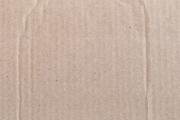 Textura da caixa de papel marrom ou papelão . — Fotografia de Stock