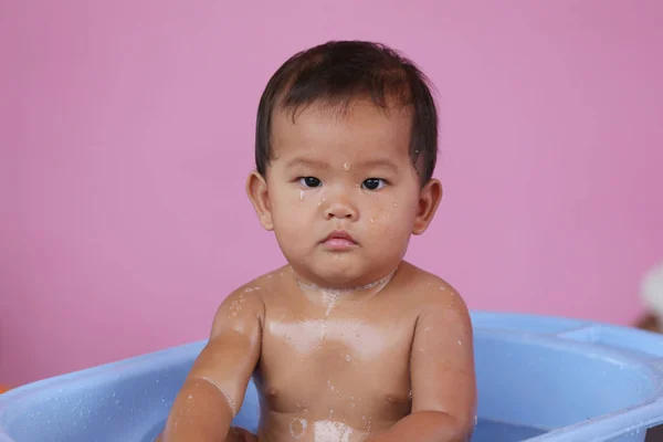 Asian baby in face a suspicion are development of Learning. — Stock Photo, Image