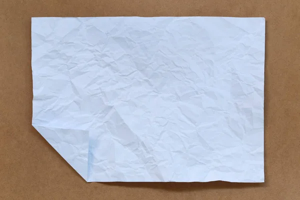 Blanco Wit Papier Vouwen Geplaatst Een Bruine Achtergrond — Stockfoto