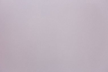 Tasarım doku arka plan için hafif pembe çimento duvar yüzeyine.