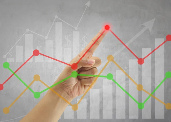 Hand der Geschäftsleute zeigt auf den höchsten Punkt auf der Liniendiagramm — Stockfoto