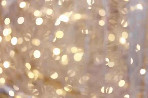 Gold Hintergrund Bokeh der Weihnachtsbeleuchtung. — Stockfoto