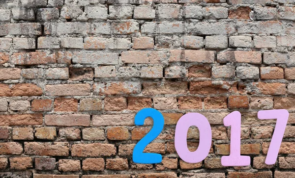 Number of 2017 on a brick wall background. — Stock Photo, Image