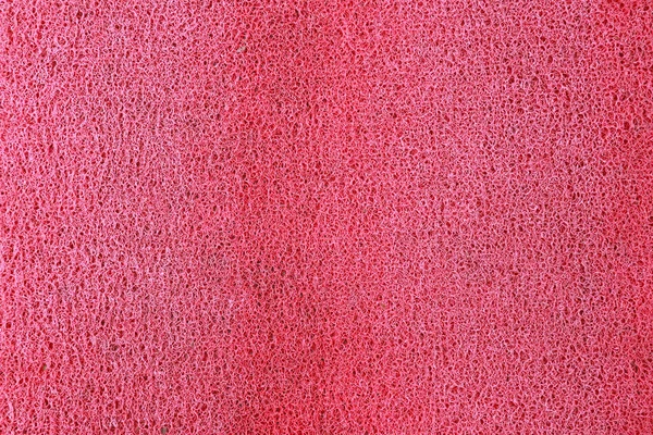 Oppervlak van rode kunststof. — Stockfoto