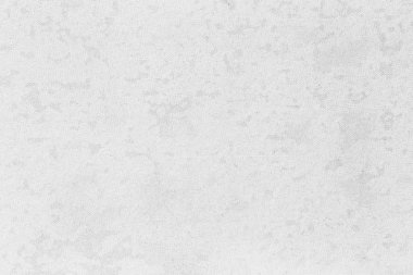 Beyaz yıpranmış beton yüzeyine.