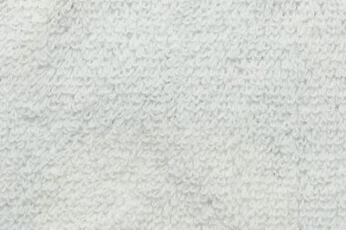 Beyaz kumaş yüzeyi.