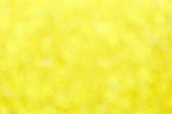 Gelbes Bokeh-Abstrakt des Musters Hintergrund. — Stockfoto
