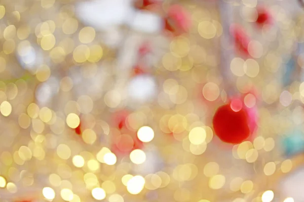 Golden bokeh blur background and red ball. — Stock Photo, Image