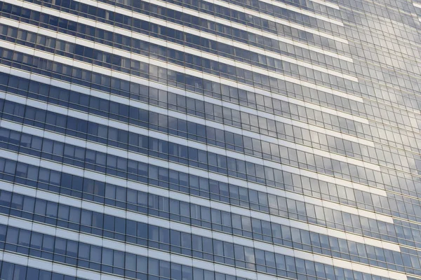 Parede de edifício alto ou vidro de fundo arranha-céu . — Fotografia de Stock