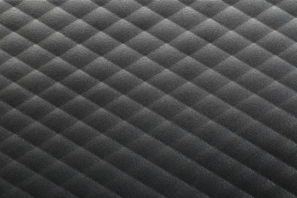 黒いプラスチックの抽象的な表面. — ストック写真
