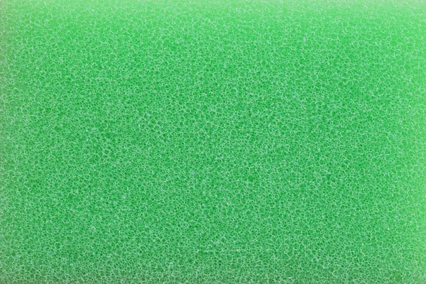 Grön svamp ytan bakgrund. — Stockfoto