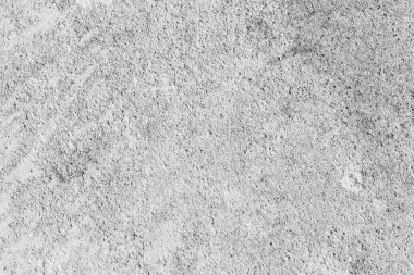 Beyaz yıpranmış beton yüzeyine.