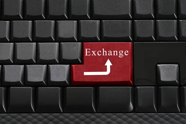 Knappsatsen på svart tangentbord och har text Exchange på enter-knappen. — Stockfoto