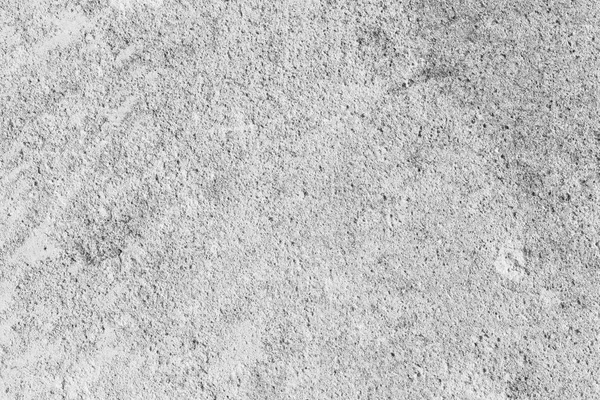 Beyaz yıpranmış beton yüzeyine.
