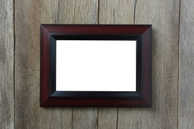 Modern resim çerçevesi ahşap duvar üzerinde.