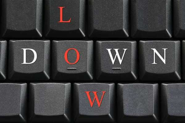 The letter of Down and Low on computer keyboard background. — Stock Photo, Image