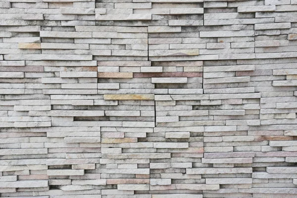 Grijze stenen muur textuur. — Stockfoto
