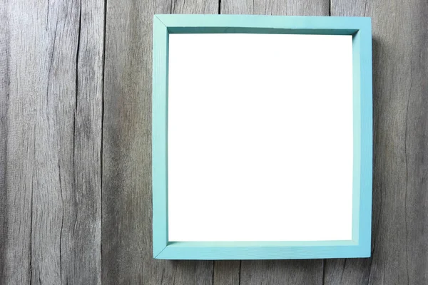 Modern resim çerçevesi ahşap duvar üzerinde.