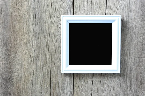 Modern Picture Frame on wooden wall. — Stock Photo, Image