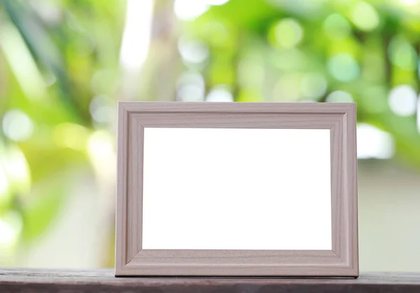 Modern Picture Frame placed on a wooden floor. — Stock Photo, Image