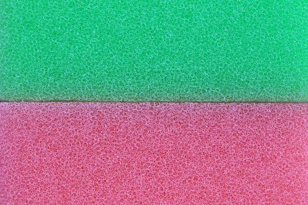 Rosa och grön svamp ytan bakgrund. — Stockfoto