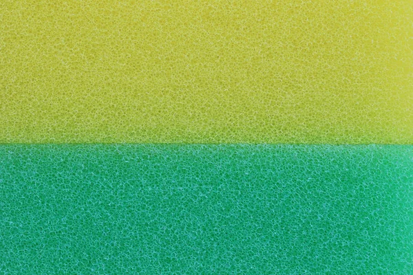 Fond de surface éponge verte et jaune . — Photo