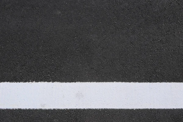 Superficie de la carretera de asfalto y línea blanca . — Foto de Stock