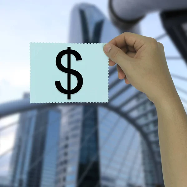 Ręka biznesmen, trzymając papier Uwaga i logo Dolar tex — Zdjęcie stockowe