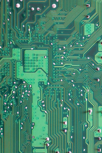 Grön dator moderkort ytan av teknik bakgrund. — Stockfoto