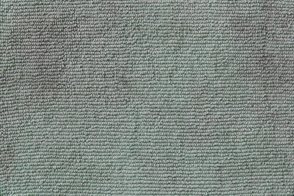 Grönt smutsiga tyg konsistens av surface textil bakgrund. — Stockfoto