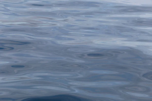 Deniz arka plan yüzey ve dalga dalgalanma var. — Stok fotoğraf