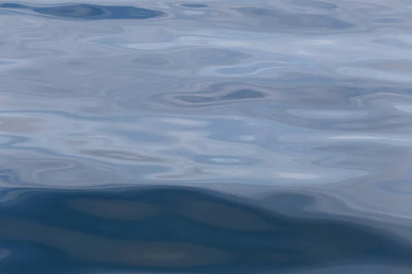 Deniz arka plan yüzey ve dalga dalgalanma var. — Stok fotoğraf