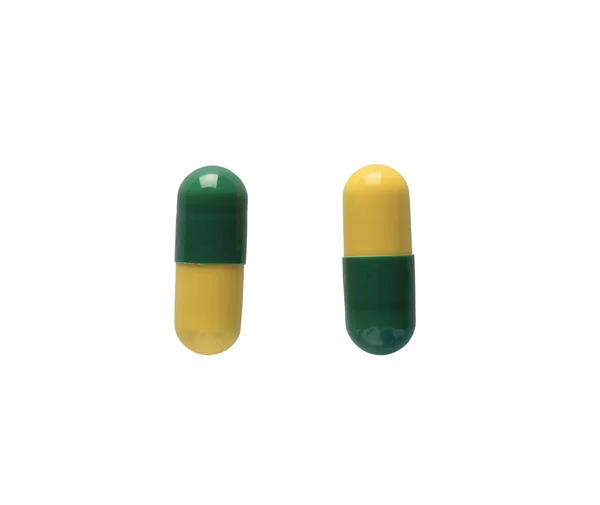 Yellow mix green Pill isolated on white background. — Stock Photo, Image