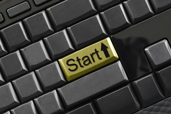 Texto de inicio en el teclado del ordenador para el diseño . — Foto de Stock
