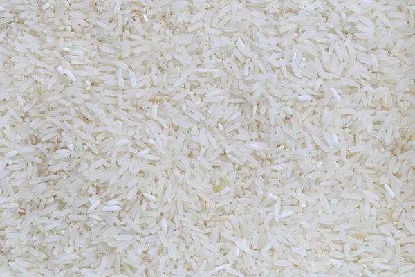Oppervlak van jasmijn rijst achtergrond. — Stockfoto