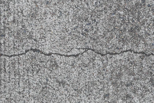 Oppervlakte van de achtergrond van de betonwegstructuur. — Stockfoto